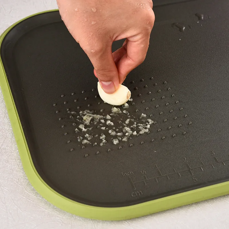 Multifunctional non-slip double-sided cutting board